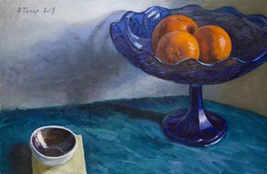 Tangerines in a blue dish thumb