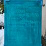 The painting with chemical formulas is a symbol of the microcosm. The artwork uses the principle of colorfield painting - a turquoise blue base color with depth effect. The chemical symbols and formulas are used as abstract elements. This artwork symbolizes the memories of the evolutionary path.