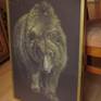 framed with wooden frame in gold color and glass