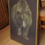framed with wooden frame in gold color and glas