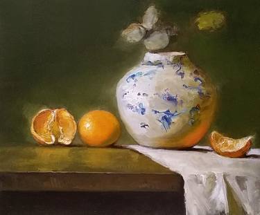 Still life with white and blue vase and oranges thumb