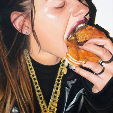 A gen z woman messily eating a hamburger. thumb