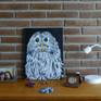 Oscar Owl On a table