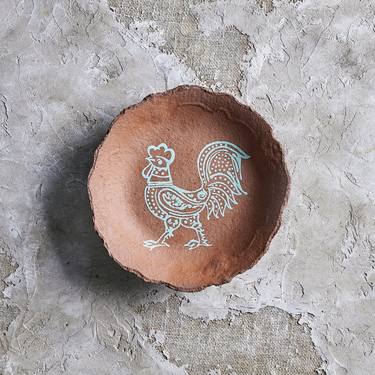 Light green rooster on a red stone ceramic plate thumb