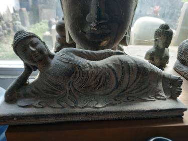 Buddha lying down thumb