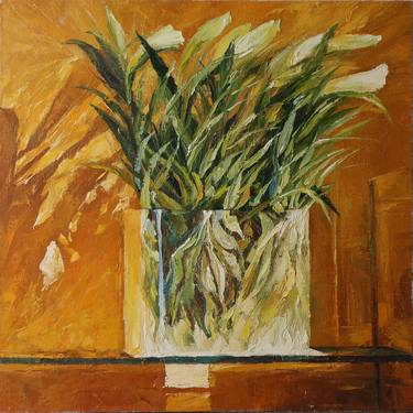 White lilies in a glass vase. thumb