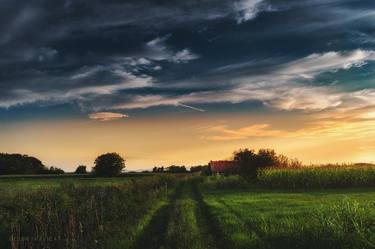 Country road at sunset thumb