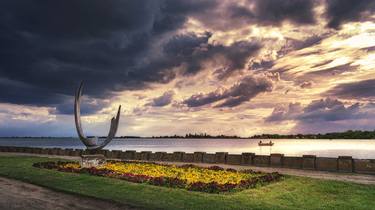 The sculpture Wings on the Palic lake under the cloudy sky thumb
