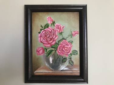 Roses in a glass vase thumb