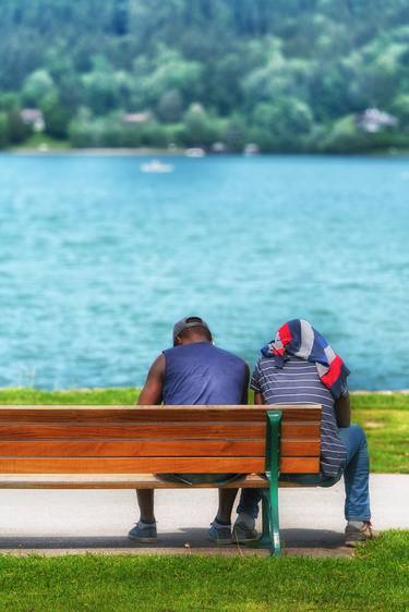 Life is easy? Black immigrants sit on the edge of a park bench at a lake in Germany, June 2019 (Color) - Limited Edition of 10 thumb