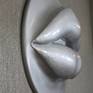 There is a visceral response to the parted lips. This is one of a series of wall hung sculptures that together will make up a story called "Scandal". The other lips in the series are licking, biting, and puckered. Each will be cast and painted in a series of daring colors. Ultimately, I see a museum wall with a multitude of these lips in the varying colors and shapes. I want to bring awareness to the reality that we are being bombarded with scandals at every turn. From click bait to the news to "Reality TV", everything we consume is scandal driven. I hope to spark discourse and bring rational thought to people's consumption habits.