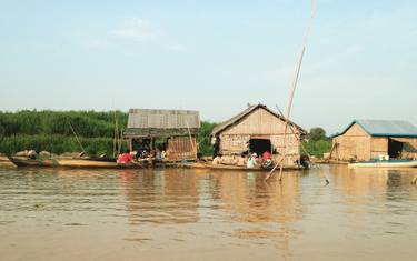 Traffic, floating villages, Tonle Sap, Cambodia thumb