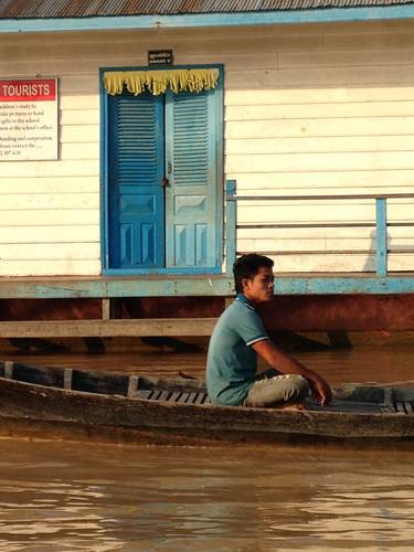 Man, floating village, Tonle Sap, Cambodia thumb