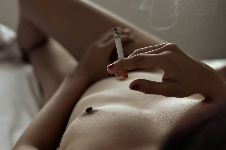 Smoking a cigarette after sex