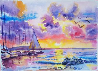 Ocean sunset with sailboats thumb