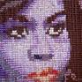 Portrait of the first lady adapted from magazine photograph. I chose shades of purple to depict this portrait for purple is a color that has royal implications. 
There are 16,000 seed beads, crystal, and metal tangs to support the work. Framed size is 19" x 24" for a weaving sized  10.5 " x 12". This is professionally framed with UV glass, deep bevel matting and deep brown hardwood edge frame.
