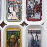 16 artistic images of women recycled from art brochures, sliced and woven onto recycled credit cards. Intricate peyote technique bead stitching borders each miniature weaving. The weavings are stitched into re-purposed, clean painted cardboard food trays which have been stitched together to form a cohesive single piece.