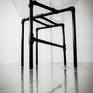 the frame, inspired by robot arms, reaches into the void with a minimalistic view of nothing