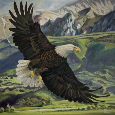 Eagle soaring over the mountains thumb