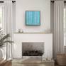 Teal Birches over a fireplace