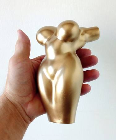 Golden Baba 1 in your hands. Gift Golden thumb