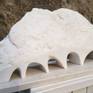 This original solid snow white marble sculpture on beautiful ivory white limestone pedestal is one of the latest artworks of the professional Bulgarian sculptor Rasho Mitev, deeply inspired by modernism, art deco and naturalism. It relpresents one holy temple portrait, symbolizing people's pure and immaculate thoughts and wishes. It is one extraordinary elaborate solid white marble carving and valuable modern home décor.