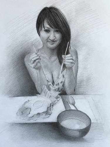 Japanese girl eating egg and ramaon thumb