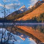 Grand Tetons at Leigh Lake, Wyoming. by Tim Fitzharris