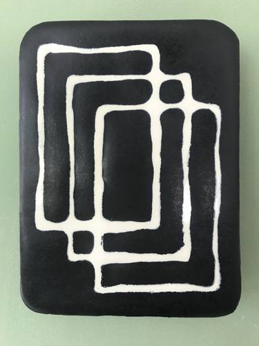 ceramic wall object with black and white rectangles thumb