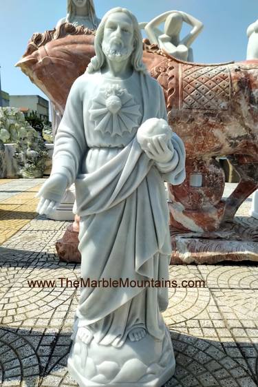 The marble statue of Jesus with the globe thumb