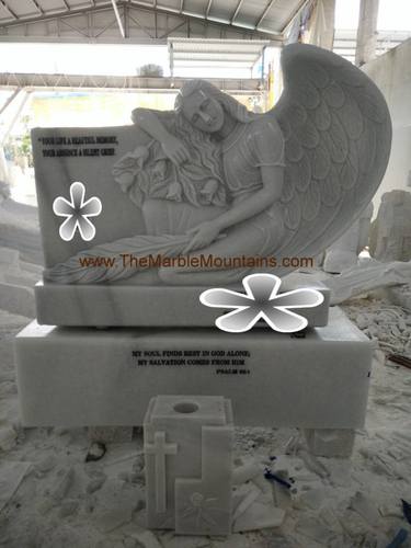 Marble grave with angels thumb
