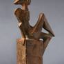 BRONZE PATENTED SCULPTURE.
FEMALE FIGURE SITTING WRITING THE HORIZON IN THE WAITING OF THE FUTURE