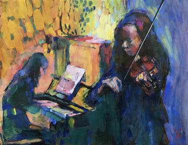 Two girls playing a music thumb