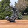 Whirlwind captured in forged metal