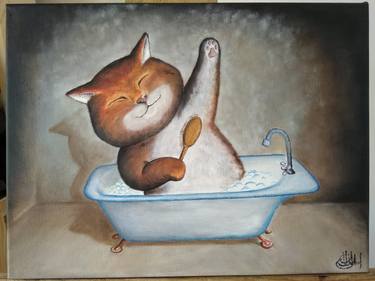 Bathing of a red cat thumb