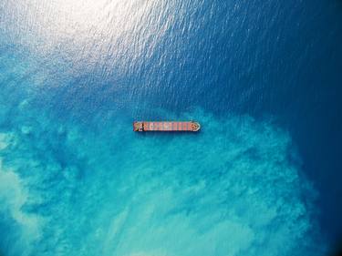 Aerial top down of a red bulk ship on a blue dramatic ocean - Limited Edition of 1 thumb