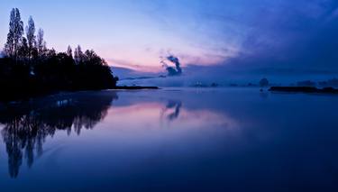 Reflections of a calm morning on the Lima River thumb