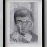 Indicating the decay of memory and presence, this work is drawn from antique photographs and family albums found at local markets. I recreate these portraits using embossed line and delicately applied charcoal before adding layers of silicone. The images are then worked and reworked as the layers of time are pulled away, exposing a faded and disintegrating visage of someone who once existed but has since been forgotten, bringing us face to face with questions of our own mortality.
Artwork comes floated in a black obeche wooden frame.
Frame size: 28.5 W x 38 H x 3 cm