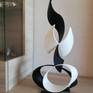 Escultura de hierro,pintura antioxido,color negro blanco.