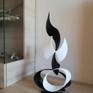 Escultura de hierro,pintura antioxido,color negro blanco.