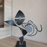 Escultura de hierro,pintura antioxido,color negro gris.