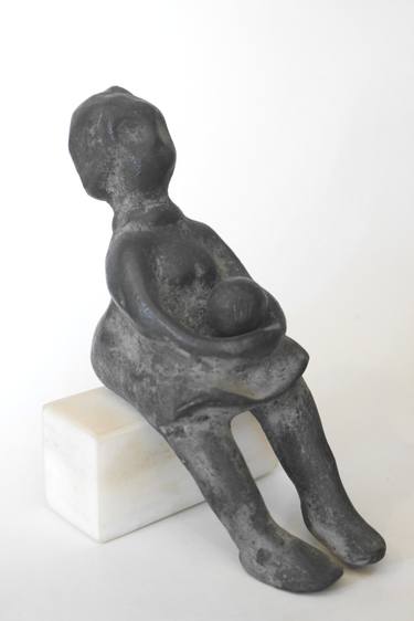 Seated girl with egg ( marble base ) thumb