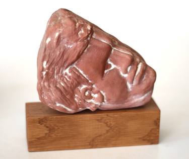 Small head in special clay thumb
