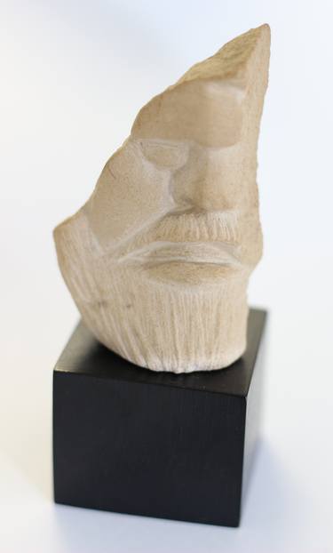 Male Head in stone thumb