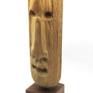 A wooden sculpture insired from the african art culture.
Sculptured on natural wood, mounted on a wooden base.