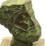 Brass bust of a man with patina mounted on a marble base.

Made by the method of pressed brass.

Inspired from the ancient history.