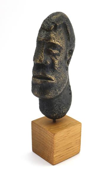 Head in brass with black patina thumb
