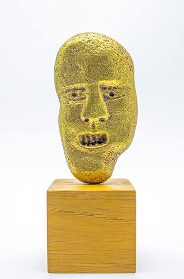 Head in pressed brass with patina thumb