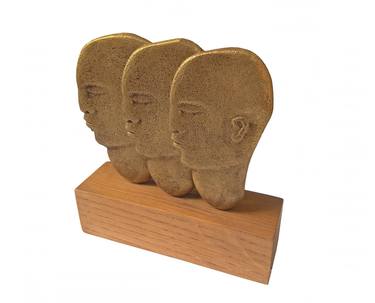 Three heads in pressed brass thumb