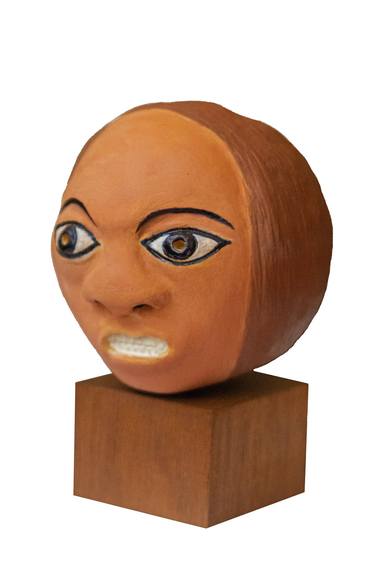 Female head in painted natural clay thumb
